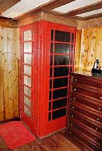 Image result for Picture of Female in an Enligh Phone Box Shower