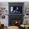 Image result for TV Next to Fireplace Modern