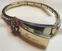 Image result for Bracelet with Secret Compartment for Drink