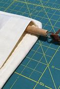 Image result for Rod with Clips to Hang Quilts