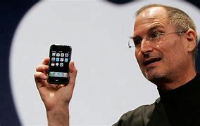 Image result for Steve Jobs Holding Newest iPhone