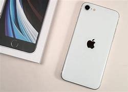 Image result for White iPhone SE 2020 with Teal Case