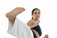 Image result for Female Karate Kick iStock