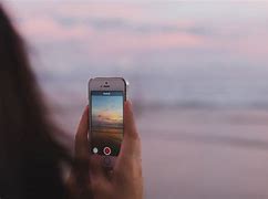 Image result for iPhone 12 Mini in Somewone Hand