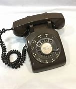 Image result for 1960s Rotary Phone in a Bag