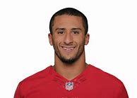 Image result for Colin Kaepernick in Green Suit