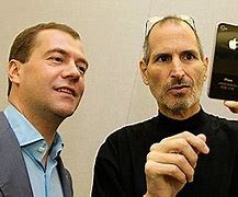 Image result for Steve Jobs Looking at iPhone