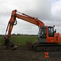 Image result for Hitachi 135 Excavator