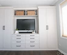 Image result for Built in Bedroom Storage Cabinets