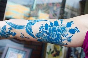 Image result for Light Blue Ink Tattoo