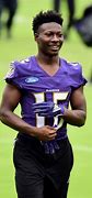 Image result for Marquise Brown in Suit