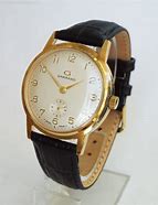 Image result for Garrard 9Ct Gold Men's Watch