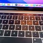 Image result for MacBook Pro with Touch Bar and Touch ID