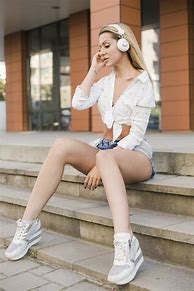 Image result for Pretty Blonde Woman Headphones