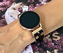 Image result for Samsung Small Bracelet Like Watch with Circle and Phone with 2 Signal Marks GPS