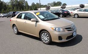 Image result for Toyota Corolla Beige 2010