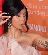 Image result for Cardi B Tattoo Stomach
