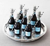 Image result for Mini Champagne Bottle Favors Case 24