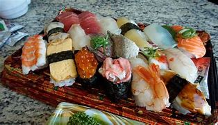 Image result for Japanese Food Served On People