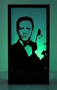 Image result for James Bond in a Red Phone Box