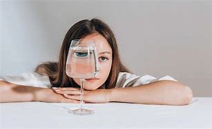 Image result for Woman Holding Water Glass
