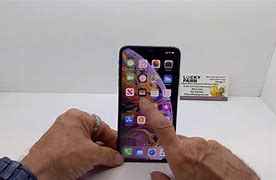 Image result for iPhone XR Max in Brown Hand