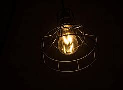 Image result for Light Bulb Dark Room