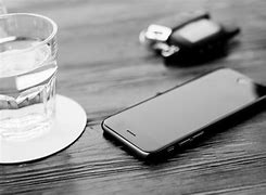 Image result for Phone On a Table