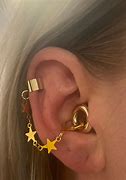Image result for Gold Ear Plugs