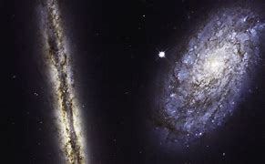 Image result for Hubble Space Telescope Captured Two Galaxies