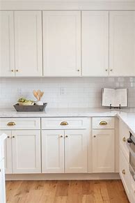 Image result for White Kitchen Cabinets with Brass Hardware