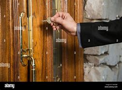Image result for Man Unlocking Door