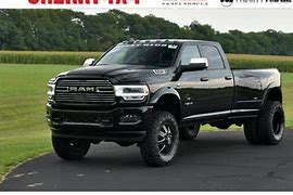 Image result for Black Ram Dually On Grass