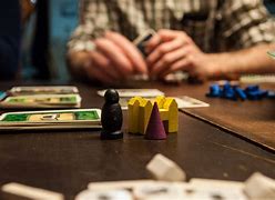 Image result for Photos of People Playing Board Games