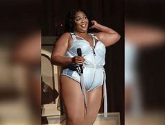 Image result for Lizzo Twerking Playing the Flute