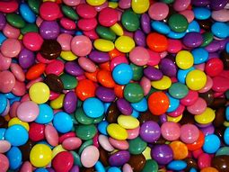 Image result for Orange Smarties Candy