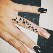 Image result for Small Star Finger Tattoos