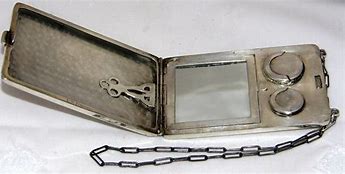 Image result for Silver Metal Purse