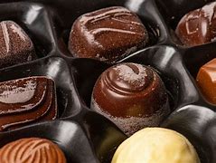Image result for Chocolate Candy with White Dots