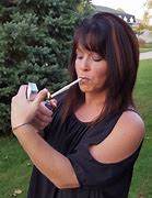 Image result for Lady with Long Cigarette Holder