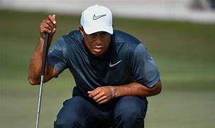 Image result for Tiger Woods Putting Grip