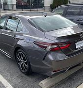 Image result for 2023 Toyota Camry XLE Mica Pre-Dawn Grey