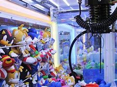 Image result for Inside an Arcade Claw Machine