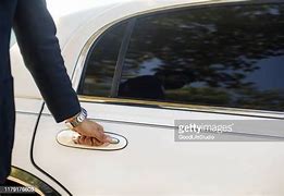 Image result for Limo Driver Opening Door for Star