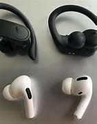 Image result for Guy with Air Pods and Beats On