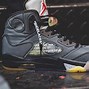 Image result for Jordan 5 Black and Gold