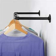 Image result for Clothes On a Hanging Rod