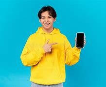 Image result for A Young Happy Man Holding Phone