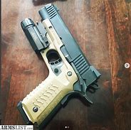 Image result for 1911 A1 with Recover Tactical Grips and 10 Round Magazine