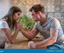 Image result for Man vs Woman Arm Wrestling